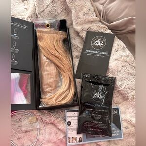 Zala hair halo and 1 set of clip ins. 
Blonde